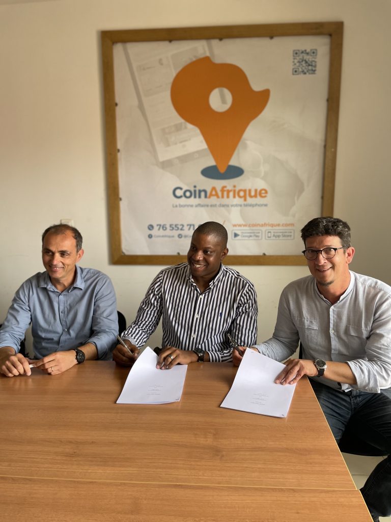 Etop, Mathias and Eric signing Autochek and CoinAfrique acquisition